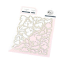 Decorative cutting die on a pink background with Woodland branding.