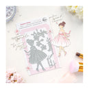 Metal die cut shapes of a ballerina with floral elements on a white background.
