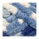 Close-up of a blue and white textured fabric