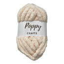 A skein of chunky, plush chenille yarn in a warm cream color, wrapped with a white paper label that reads 'Poppy CRAFTS'.