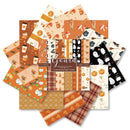A 12-piece pack of 'Gourd' themed scrapbooking paper sheets arranged in a circular fan. The collection features various autumn patterns including pumpkins, gourds, mushrooms, acorns, plaid, stripes, and ghost motifs in orange, beige, black, and brown tones.
