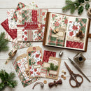 Christmas-themed scrapbooking paper set with decorative items on a wooden surface.