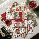 Collection of Christmas-themed scrapbooking paper sheets on a wooden surface with decorative items.