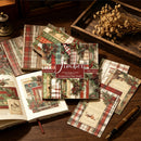 Collection of decorative paper sheets with plaid and nature-themed designs on a wooden surface.