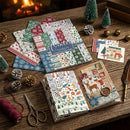 Christmas-themed stationery items on a wooden table with decorative elements.