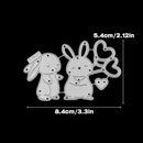 Metal cutting dies shaped like cartoon bunnies with dimensions on a black background