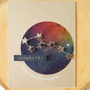Greeting card with star constellation design and 'Congrats! on your new little someone' text.