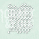 A white plastic diamond-patterned mesh screen or filter mat shown flat against a pale mint green background.