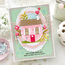 Decorative card with a house illustration and text on a light surface.