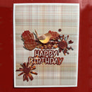 A handmade layered paper card with a plaid background, featuring a small bird, autumn leaves, and 3D text that reads 'HAPPY BIRTHDAY' in brown letters, set against a solid red background.