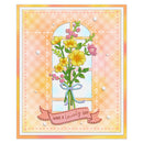A square greeting card featuring a floral bouquet with yellow and pink flowers tied with a light blue ribbon, set against an arched window motif. A pink banner at the bottom reads “HAVE A lovely DAY.
