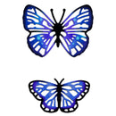 Two butterfly-shaped decorative items shown on a plain white background, one larger above and one smaller below. Both have black silhouettes with blue and purple gradient wings and cutout sections.