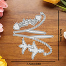 A metal die-cut craft template featuring a stylized floral or decorative scroll motif, shown on a wooden surface with printed dimension markers reading 9cm/3.54in and 7.