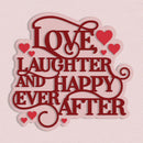 A decorative typographic sign reading “LOVE, LAUGHTER AND HAPPY EVER AFTER” in dark red lettering with red hearts, shown on a pale pink textured background.