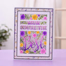 A handmade layered card with floral cutouts and the words 'MUM YOU'RE THE Best' in purple and pink, displayed on a lavender surface with a softly blurred indoor background.