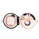 Open jewelry box with pink heart design on a white background