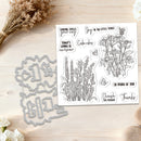 A clear stamp set and matching metal die cut file shown on a light wood background with dried flowers and white blossoms. The stamp sheet contains floral line art, butterflies, and phrases such as 'Sending smiles your way,' 'Today's gonna be awesome,' and 'So proud of you.