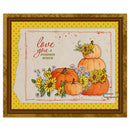 A square autumn-themed greeting card or art print with the phrase 'love you A PUMPKIN BUNCH' in red and green lettering. The design shows orange pumpkins, yellow flowers, sunflowers, and small wildflowers on a distressed cream background, surrounded by a yellow patterned border and a brown stitched frame-like edge.