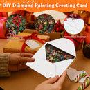 DIY diamond painting greeting card shown in a festive holiday-themed setting, with hands holding an open white envelope revealing a colorful Christmas-themed painted design inside. Two circular inset callouts highlight the design's features: 'Shiny Diamonds With Bright Colors' and 'HD Printing,' and a third inset shows a personalized handwritten message.