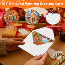 DIY diamond painting greeting card set shown with a white envelope containing a colorful holiday village design, hands holding it, wrapped gifts, candy canes, and promotional text highlighting bright colors, HD printing, and personalized blessings.
