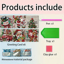 Product bundle graphic with the heading 'Products include' showing a set of Christmas-themed greeting cards, a pink pen, a green tray, a pink clay glue stick, and a rhinestone material package on a light background.