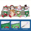 Four Christmas-themed beaded stockings displayed on a gray bench, each decorated with colorful rhinestones and topped with a dangling crystal pendant. Three close-up inset panels at the bottom show details: various shaped beads, clear printed patterns, and a faceted crystal pendant.