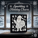 A square black canvas or plaque featuring a white glittery Santa Claus illustration with snowflakes, candy canes, trees, and gifts, displayed on a windowsill with snowy outdoor scenery behind it. Decorative text at the top reads “Sparkling Holiday Charm.