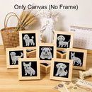 A set of small framed canvas prints featuring different dog breeds, arranged on a wooden tabletop with decorative props including a basket, wheat, a white angel statue, a 2026 desk calendar, and a small classical-style column. Text at the top reads 'Only Canvas (No Frame)'.