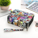 Colorful patterned wallet with a chain on a white surface with stationery items.