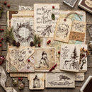Collection of vintage Christmas cards and decorations on a wooden surface.