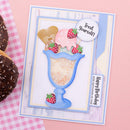 A handmade layered card featuring a blue glass sundae with pink and beige ice cream, strawberries, and a waffle cone, styled on a pink background next to chocolate donuts. The card includes text reading 'Treat Yourself!' and 'Happy Birthday with sprinkles on top!'.