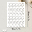 A white rectangular laser-cut sheet with a repeating floral scroll pattern, shown with dimension arrows and text indicating 15.2 cm by 20.
