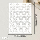 A white rectangular sheet with an allover laser-cut floral and leaf pattern, shown with dimension arrows indicating 15.2 cm by 20.