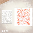 A floral stencil sheet shown in two views on a textured beige background: one white stencil with a silver-toned outline on the left, and one white stencil with a coral-orange floral pattern on the right. The text '1 PC' appears in the bottom-left corner.