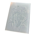 A rectangular translucent plastic mold or stamp featuring an engraved floral design with two coneflowers and a butterfly, shown on a plain white background.