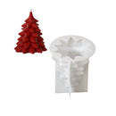 A red Christmas tree-shaped candle shown next to a white silicone mold that replicates the tree shape, on a solid white background.