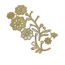 A gold-colored metal floral die-cut embellishment or craft template featuring snowflake-like blossoms and delicate leafy stems on a plain white background.