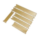 A set of gold metal embossing plates with decorative borders, arranged on a plain white background.