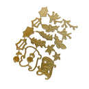 A gold-colored metal die-cut embellishment sheet featuring Christmas motifs including a Santa Claus face, sleigh, stars, holly leaves, pine branches, and mistletoe, shown on a plain white background.