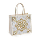 Decorative tote bag with gold mandala design on a white background