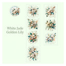 A sheet of floral stickers featuring white jade and golden lily designs, displayed on a pale green background with the text 'White Jade Golden Lily' and a circular logo that reads 'GIFT LIKE A FLOWER'.
