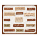 A square decorative wall plaque or sign with rounded corners, featuring multiple small fabric-texture label pieces with phrases such as 'relax,' 'Coffee,' 'aroma,' 'tea noon time tastes better,' 'warm,' 'bread,' and 'The sweet aroma.' The labels are arranged on a cream textured background with a brown border.