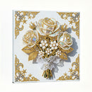 Decorative card with gold and pearl floral design on a white background