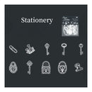 Collection of stationery items including keys and clips on a black background with 'Stationery' text.