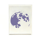 A minimalist art print featuring an abstract, organic purple shape on a warm off-white background, presented in a thin white frame against a solid white backdrop.