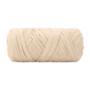 A single roll of thick braided cord or twine in a light cream-beige color, isolated on a solid white background.
