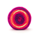 Colorful yarn ball with pink, orange, and purple hues on a white background