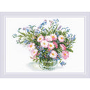 Cross-stitched pattern of a bouquet of flowers in a glass vase on a white background