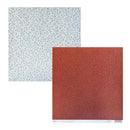 Two patterned paper sheets overlapping on a white background. The top-left sheet is pale blue with small scattered multicolor dots, and the bottom-right sheet is red with dense small white, blue and glitter dots.