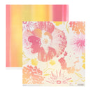 A sheet of floral patterned paper with large pink, coral, and yellow flowers on a white background, shown in front of a matching vertical striped paper sample in pink, yellow, and orange tones.